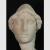 Testa di Athena da un tipo della fine del V secolo a.C. L’elmo era lavorato a parte in metallo e fissato nelle due coppie di fori presenti sui lati della sommità della testa; sul retro la lunga capigliatura fuoriusciva dal elmo; sul lato sinistro si conserva l’attacco del collo - Rinvenuta nel 1937 (n. 34); già Antiquarium n. 2010 - Tipo fine V secolo - Altezza cm 35, larghezza e profondità cm 22; marmo bianco a grana media - Musei Capitolini, Palazzo Nuovo, Magazzino sculture, inv. S 2997